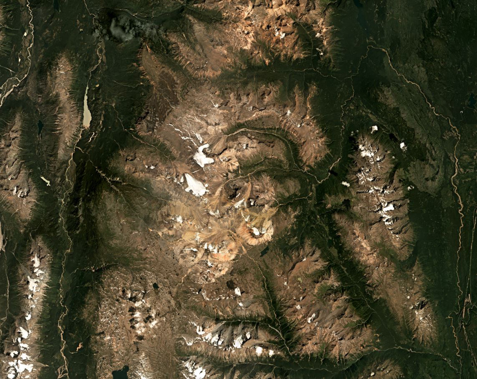 The Spectrum Range is located south of Mount Edziza within the Mount Edziza-Spectrum Range volcanic complex, shown in this July 2018 Planet Labs satellite image monthly mosaic (N is at the top; this image is approximately 48 km across). The edifice is deeply eroded and largely consists of rhyolite domes. The Mess Lake Lava Field is the darker brown area NW of the lighter-colored domes. Satellite image courtesy of Planet Labs Inc., 2018 (https://www.planet.com/).