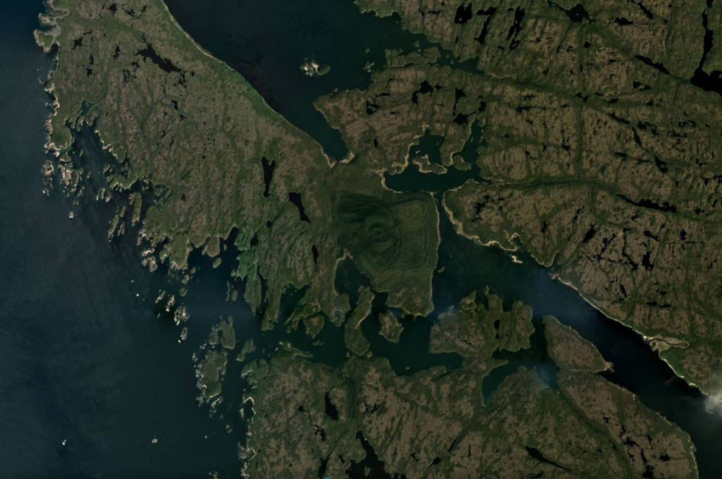 The Milbanke Sound Group contains several cones, with the best preserved Kitasu Hill scoria cone on Swindle Island in the center of this July 2018 Planet Labs satellite image monthly mosaic (N is at the top; this image is approximately 15 km across). Nearby Lake Island and Lady Douglas Island also contain cones and lava flows. Satellite image courtesy of Planet Labs Inc., 2018 (https://www.planet.com/).