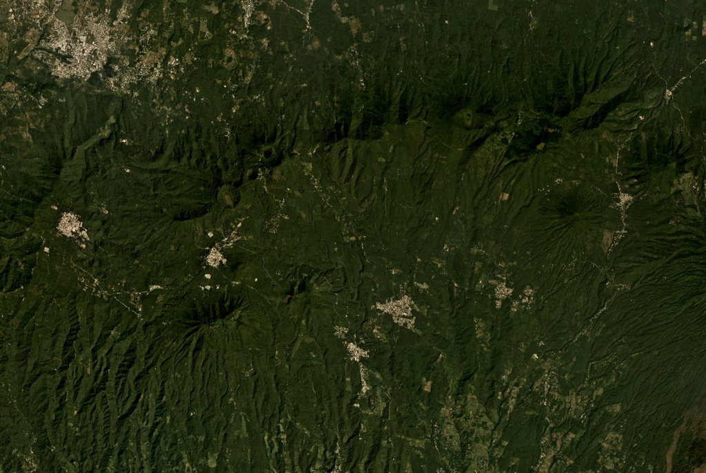 The E-W trending Apaneca Range is across the middle of this November 2019 Planet Labs satellite image monthly mosaic (N is at the top; this image is approximately 25 km across). The range includes the roughly E-W ridge along the upper half of this image, and the two cones below it – the linear Cerro de Apaneca and Cuyotepe just E of it. The crater on the western end of the ridge is Laguna las Ninfas, and the small lake NE is Cerro Laguna Verde. West of those is the  Concepción de Ataco caldera. Satellite image courtesy of Planet Labs Inc., 2019 (https://www.planet.com/).