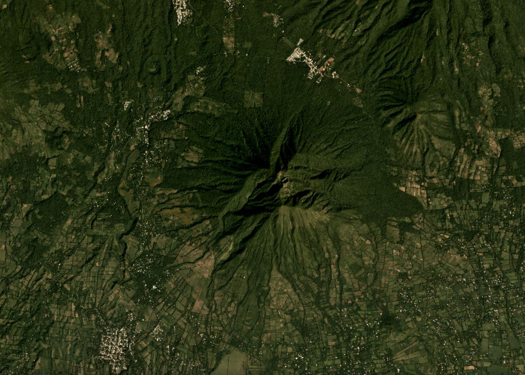Usulután is the eroded volcano in the center of this November 2019 Planet Labs satellite image monthly mosaic (N is at the top; this image is approximately 12 km across). The eroded flank in the NE corner is El Tigre and the small cone between them is La Manita. Satellite image courtesy of Planet Labs Inc., 2019 (https://www.planet.com/).