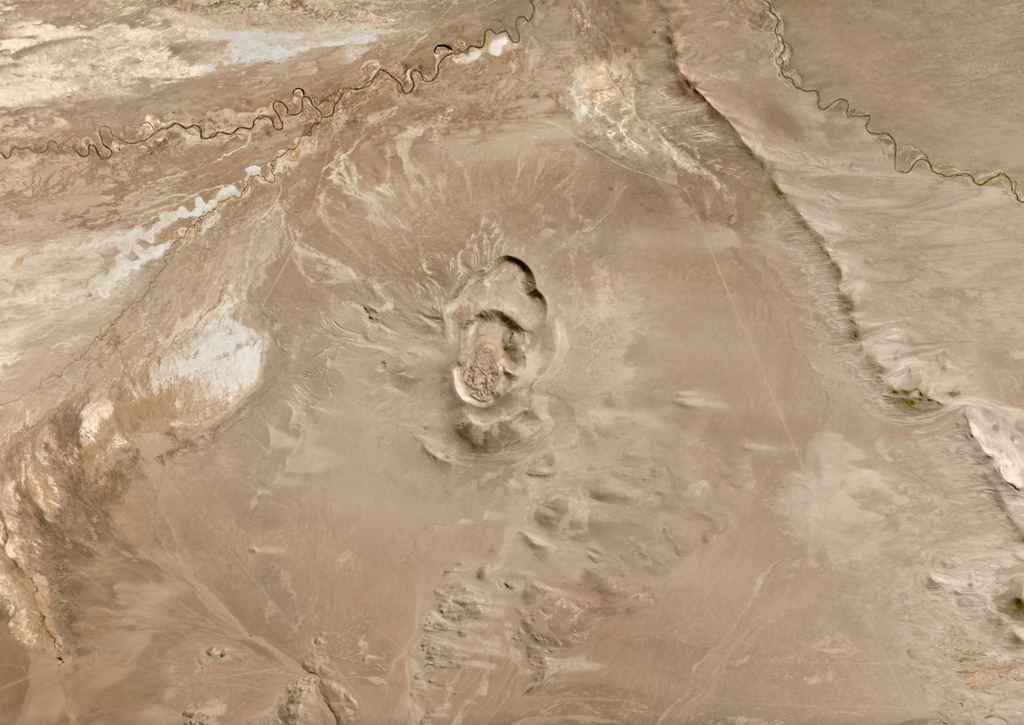 Cerro Volcán Tambo Quemado is located in the Bolivian Altiplano and is in the center of this June 2019 Planet Labs satellite image monthly mosaic (N is at the top; this image is approximately 24 km across). Three overlapping craters form the complex, with a lava dome inside the youngest. Satellite image courtesy of Planet Labs Inc., 2019 (https://www.planet.com/).