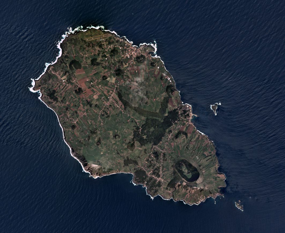 The roughly 7 x 12 km Graciosa island in the Azores archipelago has a 1.2 x 1.9 km caldera at the SE end, shown in this April 2019 Planet Labs satellite image monthly mosaic (N is at the top). The NW area contains scoria cones, many that have undergone flank collapse or rafting during Strombolian eruptions leaving an amphitheater shape, and lava flows. The growth of the island has been disrupted by multiple major flank collapse events through time. Satellite image courtesy of Planet Labs Inc., 2019 (https://www.planet.com/).