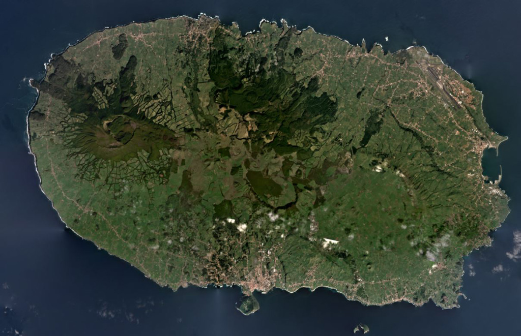 Four main volcanic centers form the 29-km-wide Terceira Island shown in this February 2020 Planet Labs satellite image monthly mosaic (N is at the top). The Santa Barbara edifice with the summit caldera is to the W, with lava domes and coulées both in the caldera and on the flanks, concealing an older caldera on the NE flank. The Pico Alto complex is at the north of the center of the island and to the south of that is the Guilherme Moniz caldera. The NE and SW Cinco Picos caldera rims are exposed on the SE side of the island, with the São Sebastião crater near the SE boundary. Satellite image courtesy of Planet Labs Inc., 2020 (https://www.planet.com/).