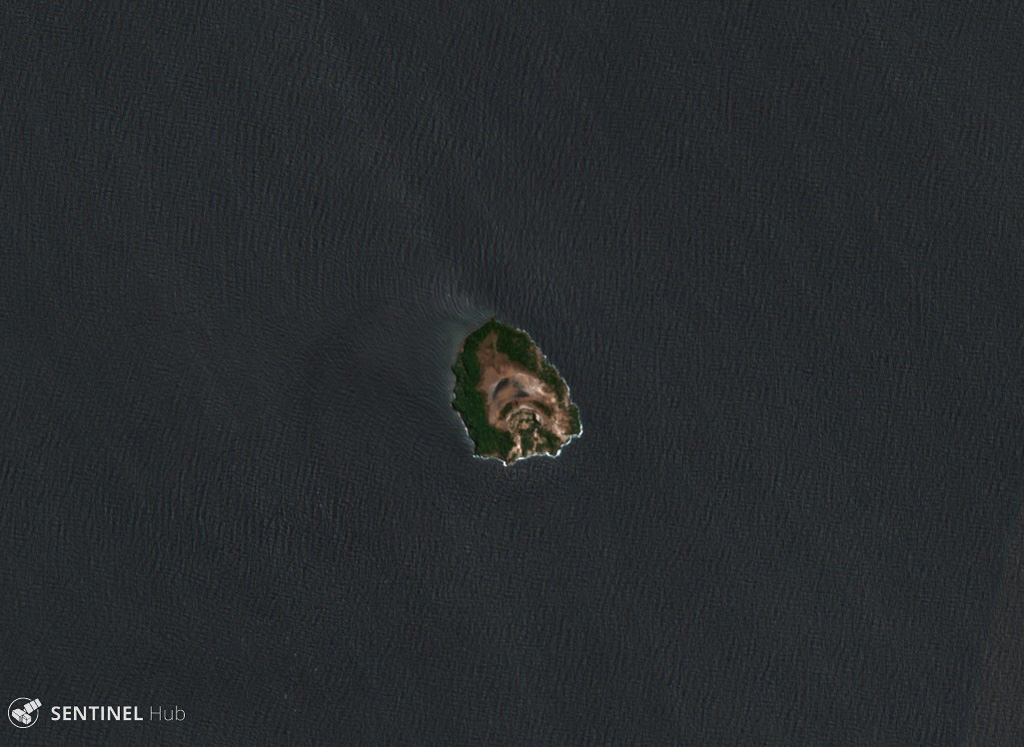 The small Manuk island is shown in this 10 September 2019 Sentinel-2 satellite image and is located in the eastern Banda volcanic arc. While the island is small, the edifice rises about 3 km from the sea floor. There appear to be several nested craters and/or flank collapse scarps opening towards the S. Geothermal activity continues on the island. Satellite image courtesy of Copernicus Sentinel Data, 2019.