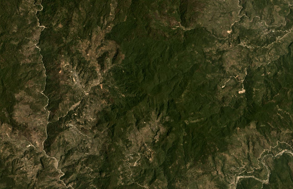 Patoc volcano in northern Luzon, Philippines, is in the center of this April 2019 Planet Labs satellite image monthly mosaic (N is at the top; this image is approximately 11.5 km across). The edifice has undergone extensive erosion and is now vegetated. Satellite image courtesy of Planet Labs Inc., 2019 (https://www.planet.com/).