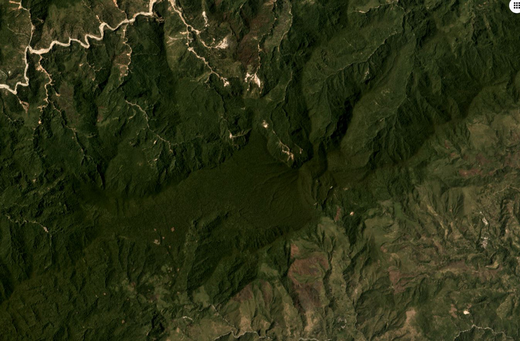 The Ambalatungan Group in northern Luzon, Philippines, is in the central area of this April 2019 Planet Labs satellite image monthly mosaic (N is at the top; this image is approximately 12 km across). The complex has formed by three edifices across a nearly E-W trend, Ambalatungan, Bumabag, and Binluan that has the scarp and relatively smooth western flank near the center of this image. Satellite image courtesy of Planet Labs Inc., 2018 (https://www.planet.com/).