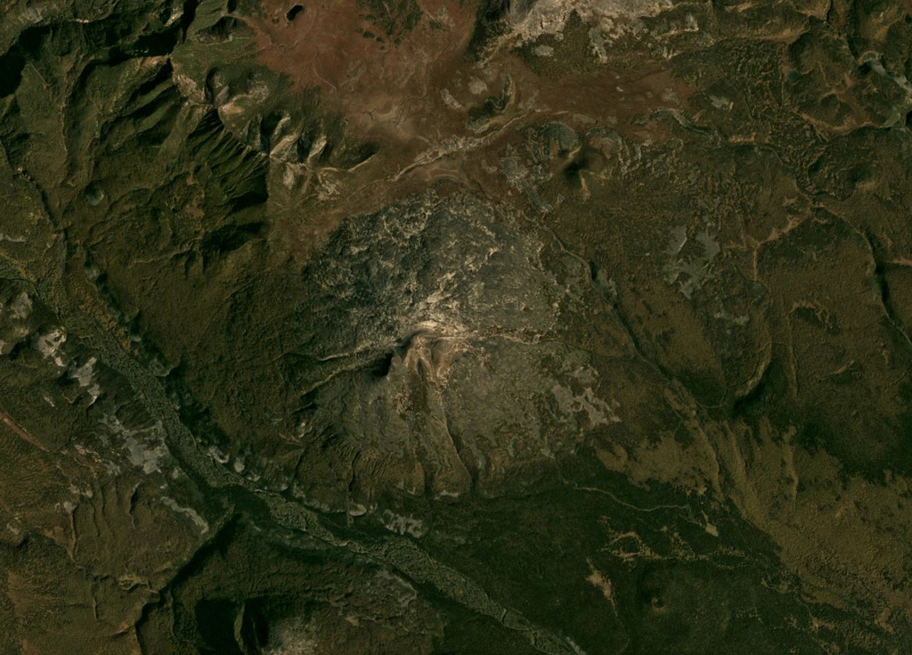 Several cones form the summit area of Romanovka volcano in the center of this September 2019 Planet Labs satellite image monthly mosaic (N is at the top; this image is approximately 13 km across). The edifice covers an area of 24 km2 and has undergone relatively-little erosion, except for stream erosion around the lower flanks. Satellite image courtesy of Planet Labs Inc., 2019 (https://www.planet.com/).