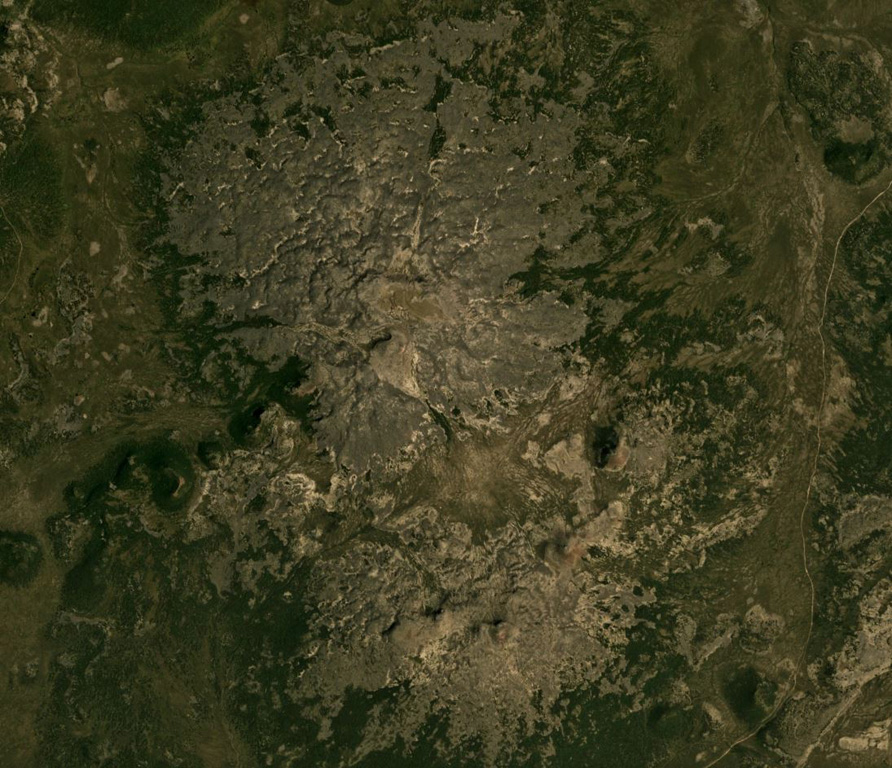Kekurny has two main edifices, the main edifice to the north, and Bunanya in the lower-center of this August 2019 Planet Labs satellite image monthly mosaic (N is at the top; this image is approximately 12 km across). From the summit of Bunanya there is a NE-SW trend of scoria cones. Satellite image courtesy of Planet Labs Inc., 2019 (https://www.planet.com/).