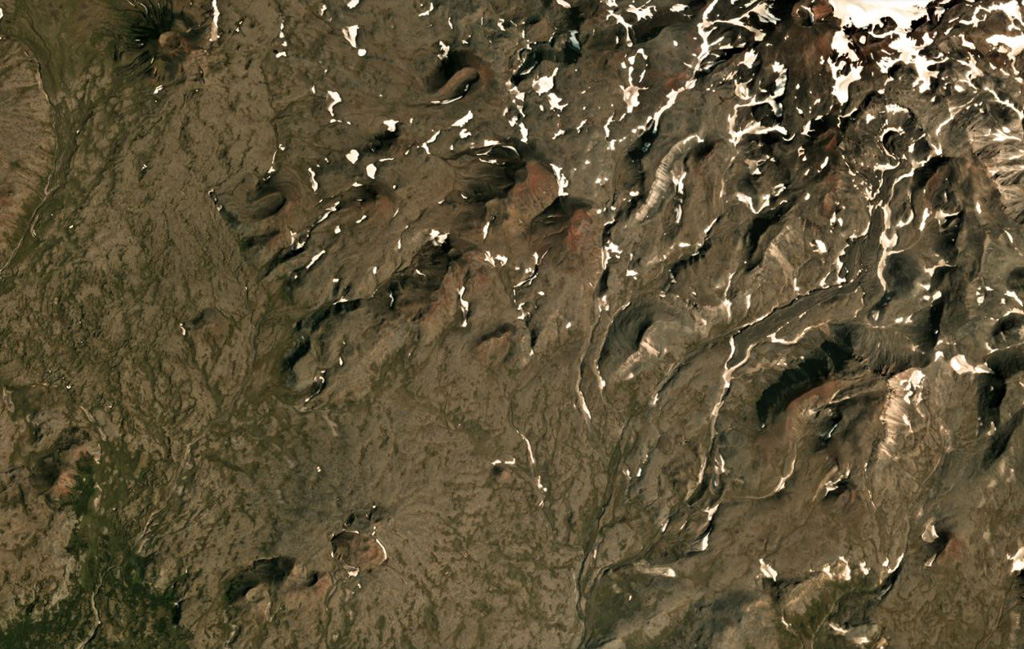 Several scoria cones on the Sedanka Lava Field are shown in this September 2019 Planet Labs satellite image monthly mosaic (N is at the top; this image is approximately 13 km across). The Gorny Institute volcanic complex is to the upper right and the Sredny scoria cone of Tuzovsky is to the upper left, and between them are scoria cones of Sedanka. The field has more than 100 cones across an area of around 10 km. Satellite image courtesy of Planet Labs Inc., 2019 (https://www.planet.com/).
