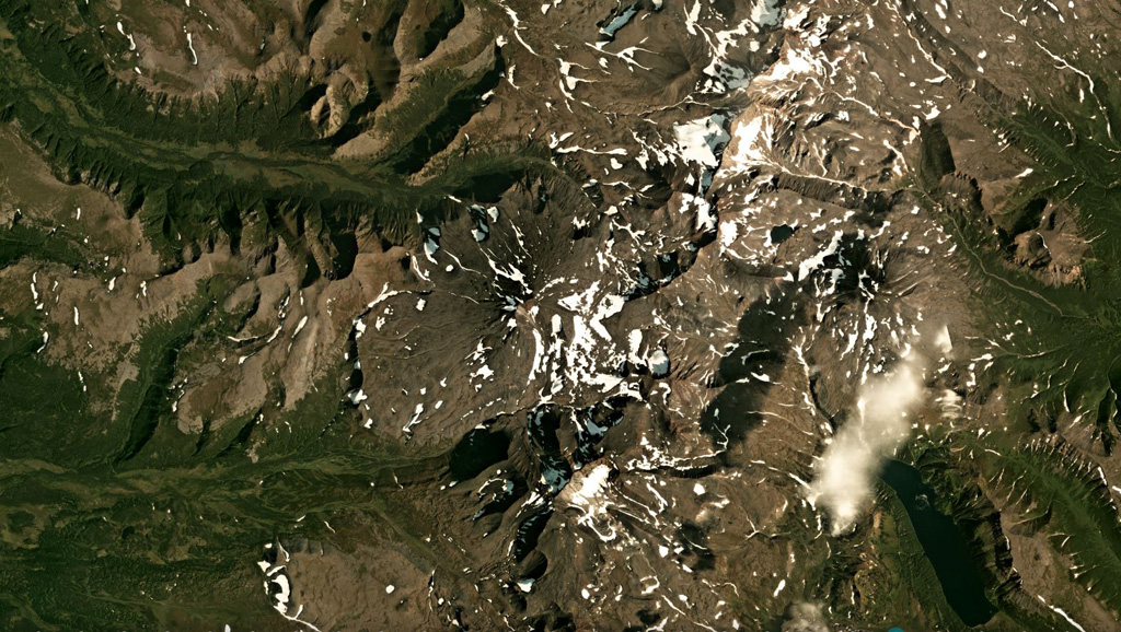 Alngey volcano is near the center of this August 2019 Planet Labs satellite image monthly mosaic (N is at the top; this image is approximately 30 km across). The Pleistocene Kamenisty is to the SE and Uka is the cone to the E. It is part of the Sredinny Range in Kamchatka, Russia. Satellite image courtesy of Planet Labs Inc., 2019 (https://www.planet.com/).