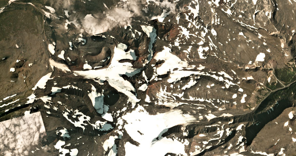 Iktunup volcano in the northern Sredinny Range of Kamchatka is in the center of this Planet Labs satellite image monthly mosaic (N is at the top; this image is approximately 14 km across). The smaller complex cone on the western flank is Tunipilyakum. Satellite image courtesy of Planet Labs Inc., 2019 (https://www.planet.com/).