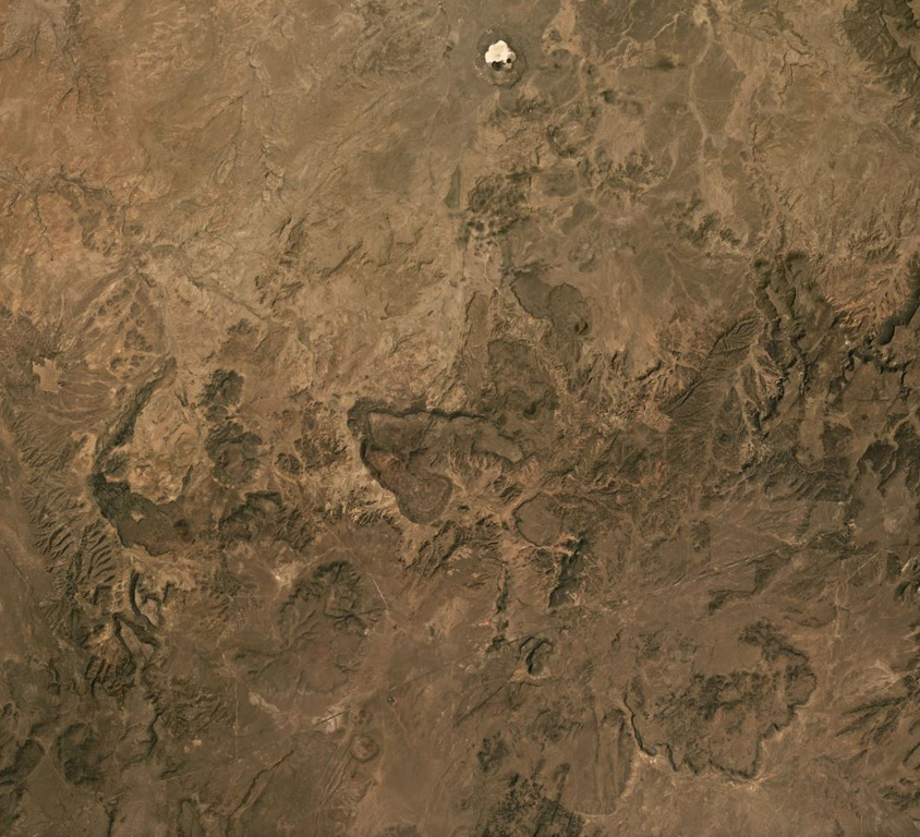 The Red Hill-Quemado Volcanic Field in New Mexico, USA, contains more than 40 scoria cones, some of which are in the area shown in this August 2019 Planet Labs satellite image monthly mosaic (N is at the top; this image is approximately 34 km across). There are also phreatomagmatic features including the 2-km-wide Zuni Salt Lake maar at the top of this Planet Labs satellite image monthly mosaic (N is at the top; this image is approximately 69 km across). Satellite image courtesy of Planet Labs Inc., 2019 (https://www.planet.com/).