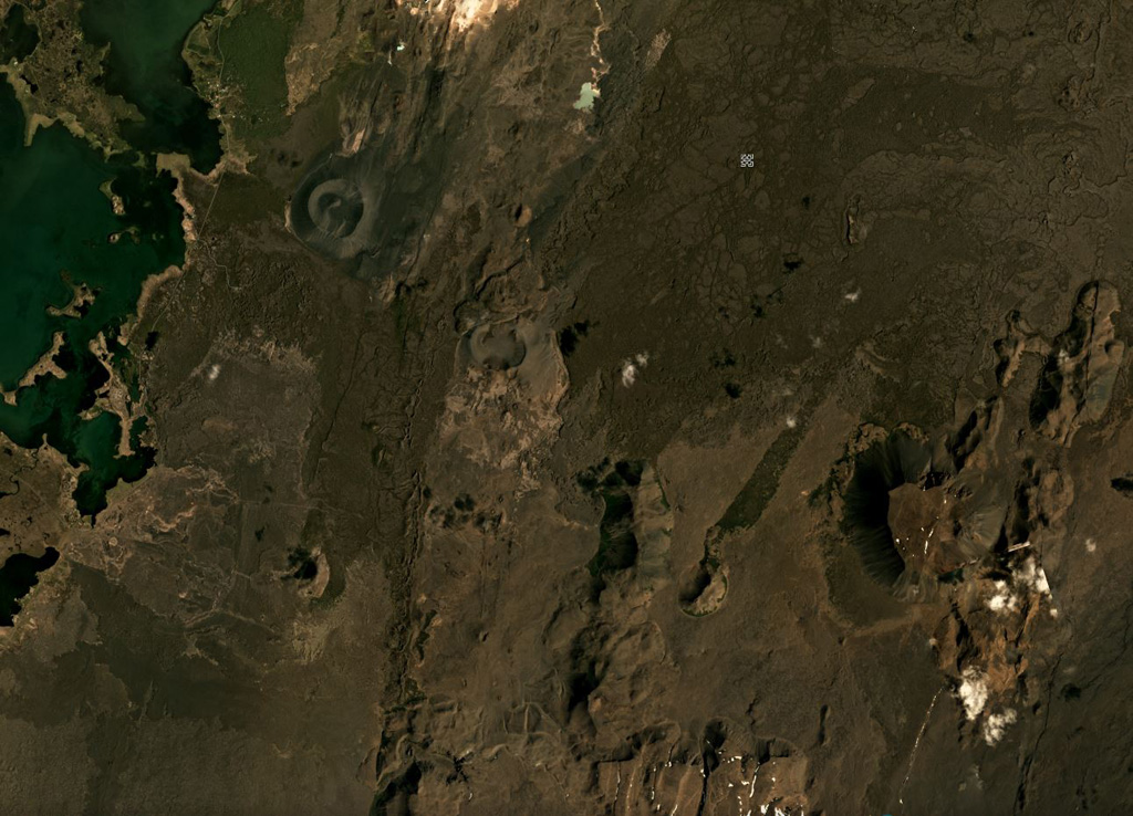 Heiðarsporðar (Heidarspordar) is about 22 km in length, with a smaller area shown in this June 2019 Planet Labs satellite image monthly mosaic (N is at the top; this image is approximately 20 km across). Around 2,200 years ago it produced a lava field around 220 km2 in size, reaching 60 km away from the source. The darker area in the upper left corner is Mývatn lake. Satellite image courtesy of Planet Labs Inc., 2019 (https://www.planet.com/).