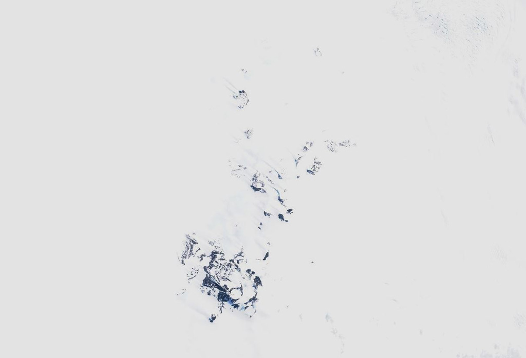 The Pleiades volcanic group is located in Melbourne Volcanic Province of Antarctica and is shown in the center of this 8 December 2019 Sentinel-2 satellite image (N is at the top; this image is approximately 20 km across). Mt. Pleiones is in the south of the southernmost exposed area, and Mt. Atlas forms the northeastern exposed area. Features to the north include the Alcyone and Taygete cones. Satellite image courtesy of Copernicus Sentinel Data, 2020.