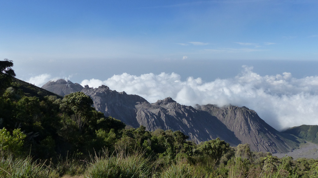 This view from the lookout point on the W flank of Santa Maria shows the Santiaguito dome complex on 27 February 2020. From left to right (approximately NE-SW) the domes are El Caliente, La Mitad, El Monje, and El Brujo. Photo by Ailsa Naismith, 2020.