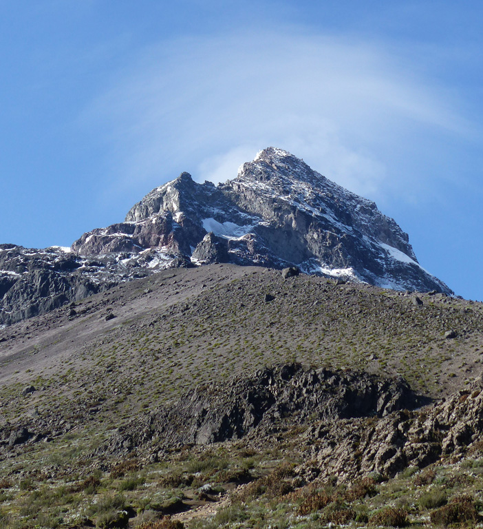 Illiniza Sur is the older of the two peaks that form the Illiniza complex. This November 2015 view from the NE shows some of the stratigraphy exposed by extensive erosion. Photo by Ailsa Naismith, 2015.