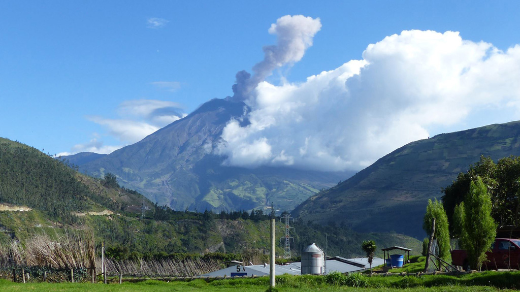 This 21 October 2015 photo shows an ash plume rising from Tungurahua, seen from the Observatorio del Volcán Tungurahua (OVT) to the NNW, near the village of Patate, operated by the Instituto Geofisico de la Escuela Politecnico Nacional (IG-EPN). Activity in 2015 was characterized by frequent ash and gas emissions and a variety of seismicity, including volcano-tectonic and long-period events. Photo by Ailsa Naismith, 2015.