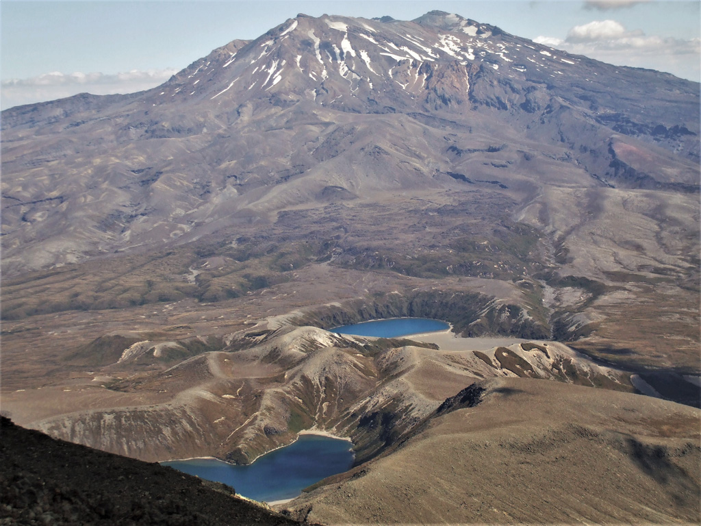 This 2008 view is from the Ngauruhoe summit at Tongariro, to the south towards Ruapehu. In the foreground are the Upper Tama (foreground) and Lower Tama lakes, vents that predate formation of the Ngauruhoe cone. Photo by Janine Krippner, 2008.